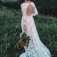 Backless wedding dress with shaped cut from behind by Anna Skoblikova