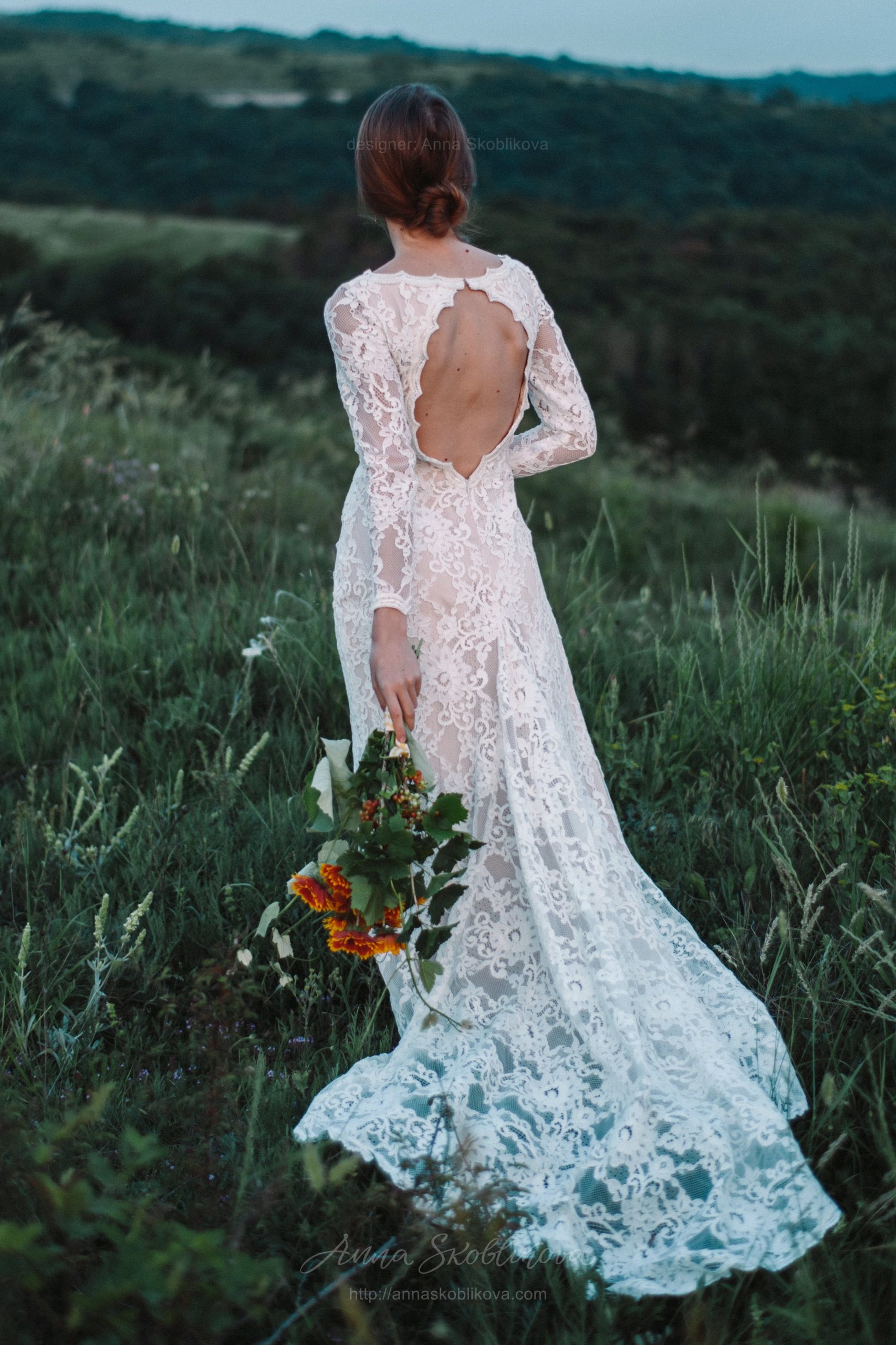Backless wedding dress with shaped cut from behind by Anna Skoblikova Backless wedding dress with shaped cut from behind by Anna Skoblikova