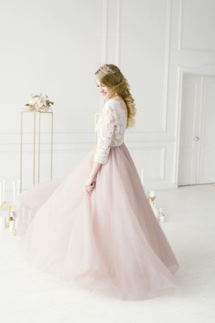 Light pink wedding dress with 34 sleeves by Anna Skoblikova