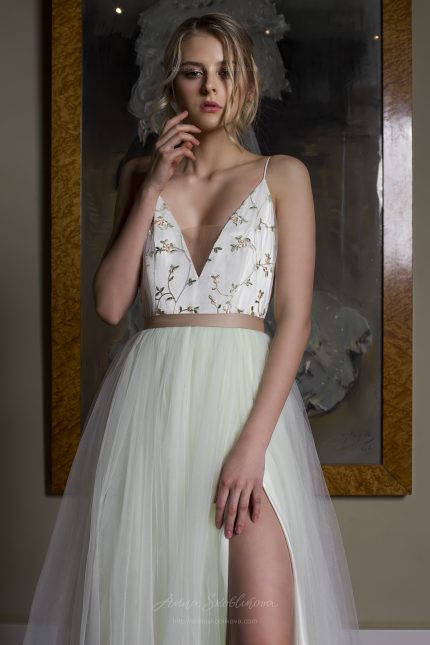Photo 2: Unique designer wedding dress with a full skirt